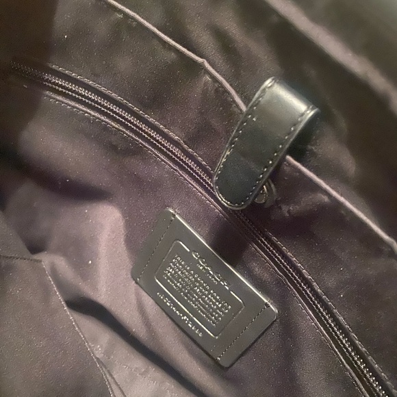 Coach briefcase. Posed w/purse pillow to demonstrate shape. Used once. No marks. - Picture 6 of 7